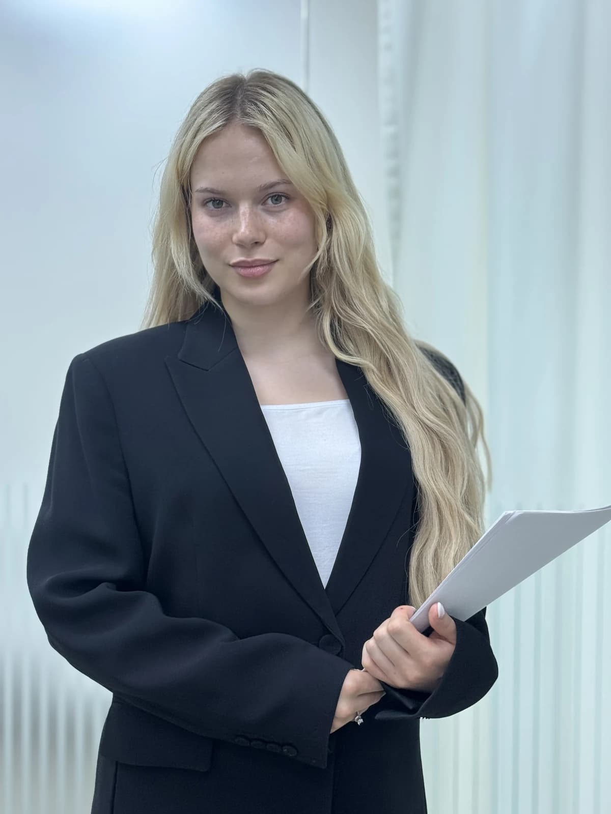 Algosutraa team member reviewing trading documentation